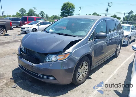2014 Honda Odyssey Lx z USA, uszkodzony, nr VIN 5FNRL5H25EB118703